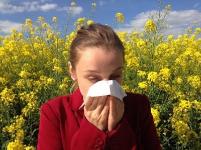 woman experiencing allergies